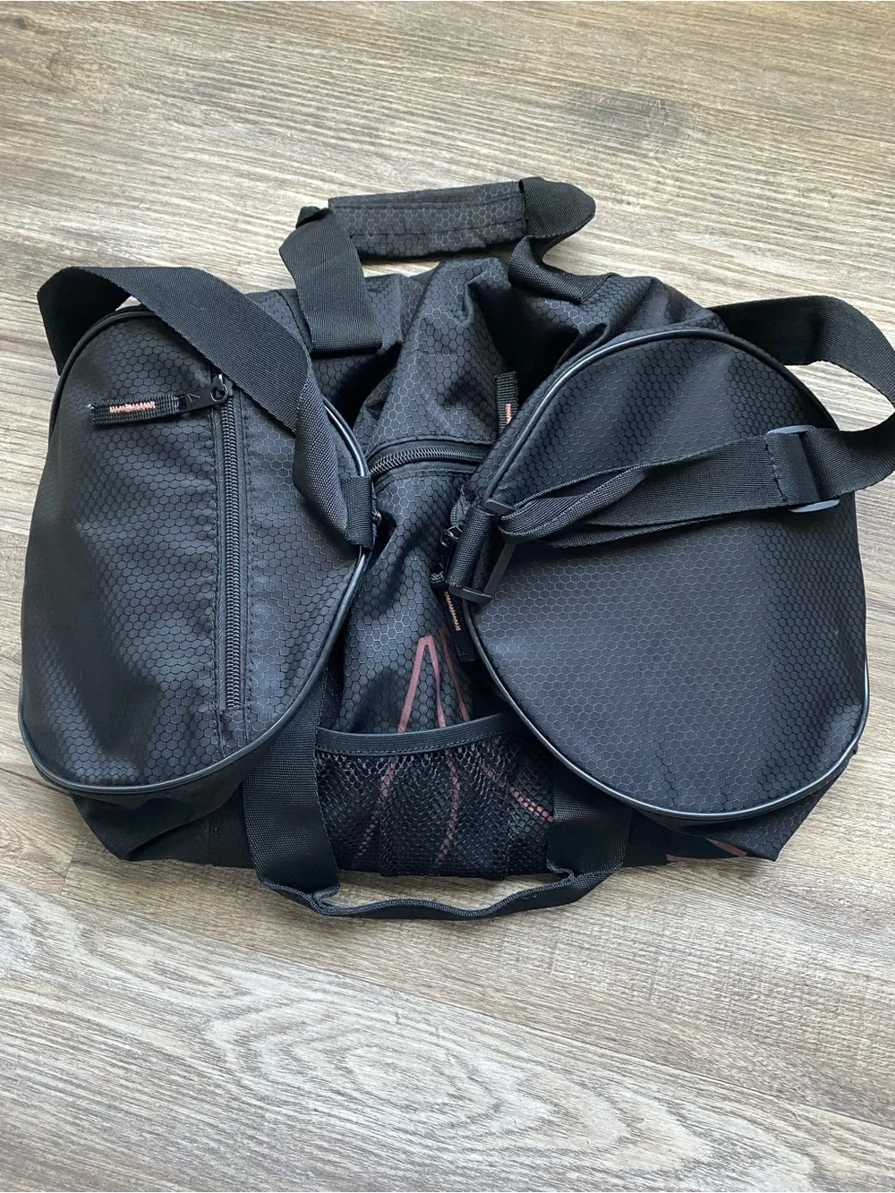 Reebok Women’s Black Duffel Bag with Subtle Rose Accents